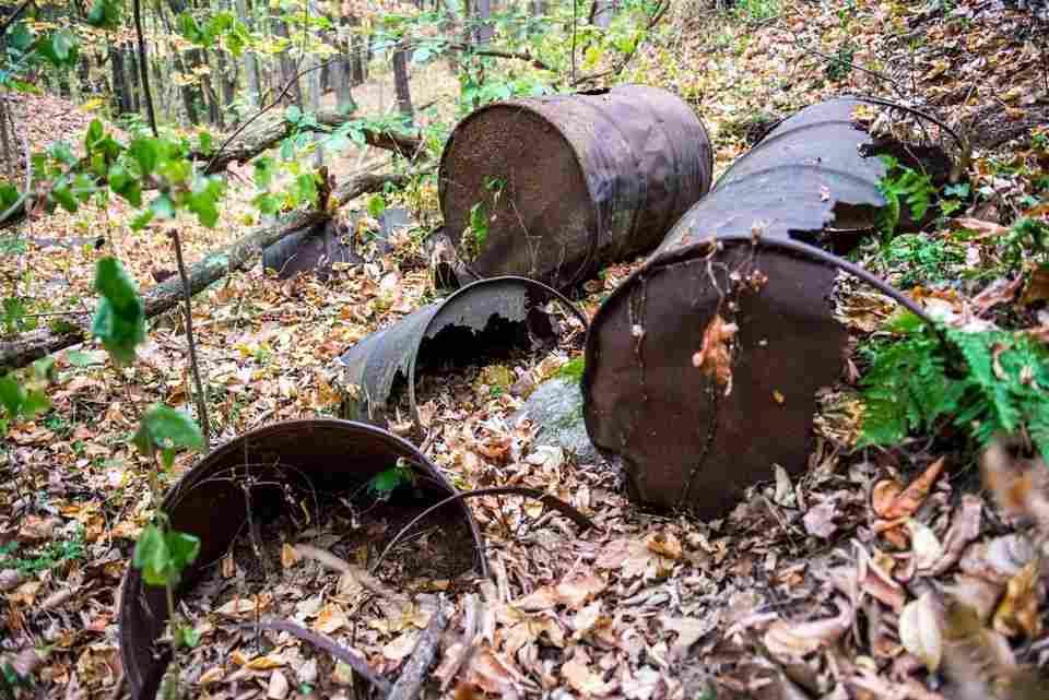 Metal drums and tannery waste at a former Wolverine World Wide dump site in Belmont, MI, where drinking water has been polluted with PFAS compounds. (Source: http://www.mlive.com/news/grand-rapids/index.ssf/2017/11/varnum_wolverine_lawsuit.html)